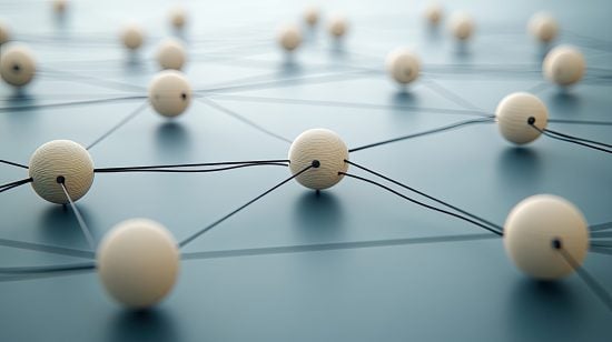 Wooden figures connected by black lines illustrate the concept of social and business networking against a vibrant blue background.